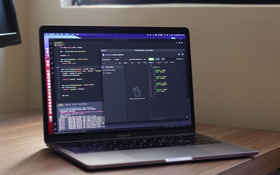 Laptop showing API code